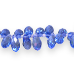 Teardrop-shaped faceted glass beads
