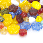 Mix of colored glass beads with flower shapes, 8-15mm, 50/100g pack