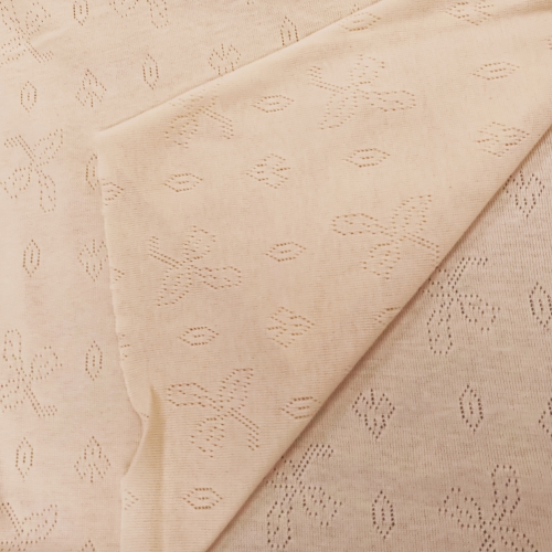 Soft cotton fabric with a subtle eyelet pattern, 150 cm 